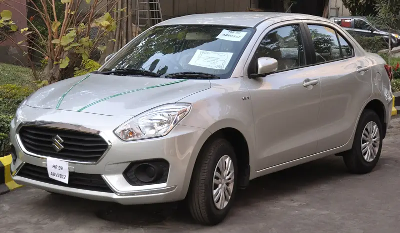 White Maruti Suzuki Dzire sedan available for rent in Siliguri