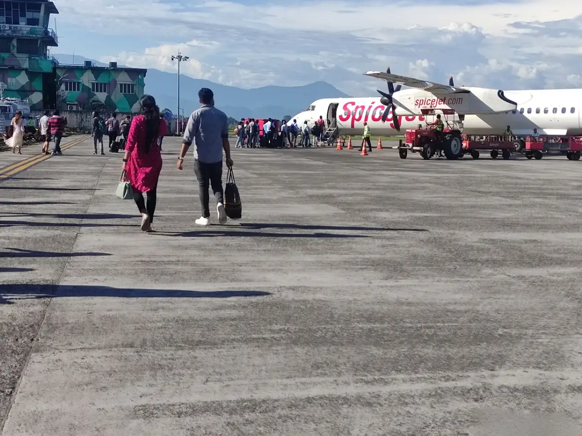 Bagdogra International Airport with the Himalayas visible behind the runway